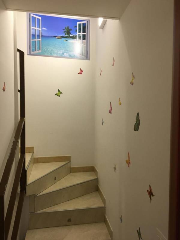 Camera Familiare con Bagno in Comune
